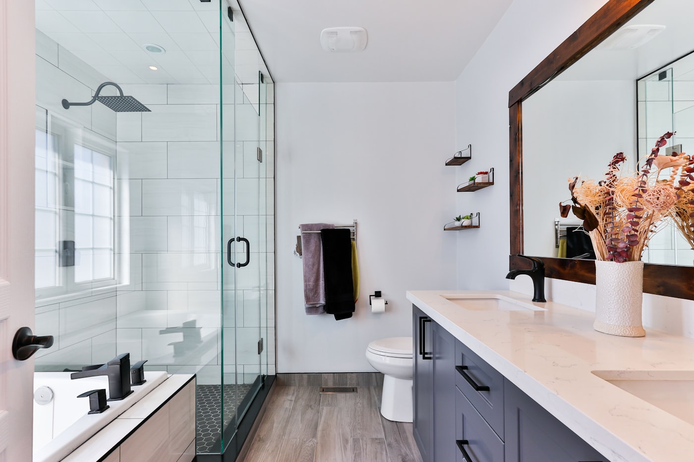 Elegant bathroom vanity with wall sconces