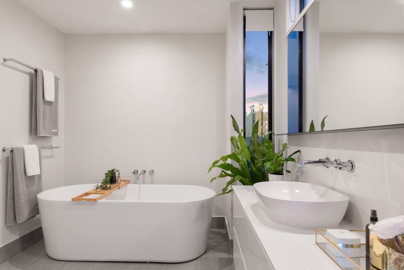 Refined bathroom remodel with patterned tile and modern vanity